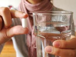 Photo: Prendre des antibiotiques après l'implantation