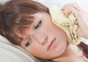 Photo: La présence de douleur après l'implantation